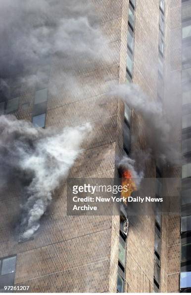 flames-and-smoke-pour-from-the-upper-stories-of-30-waterside.jpg