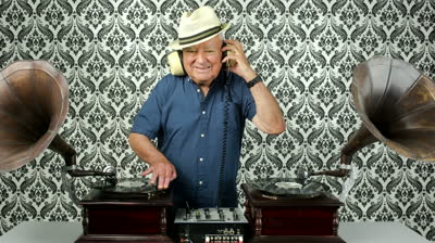 stock-footage-a-very-funky-elderly-grandpa-dj-mixing-records-with-gramophones.jpg