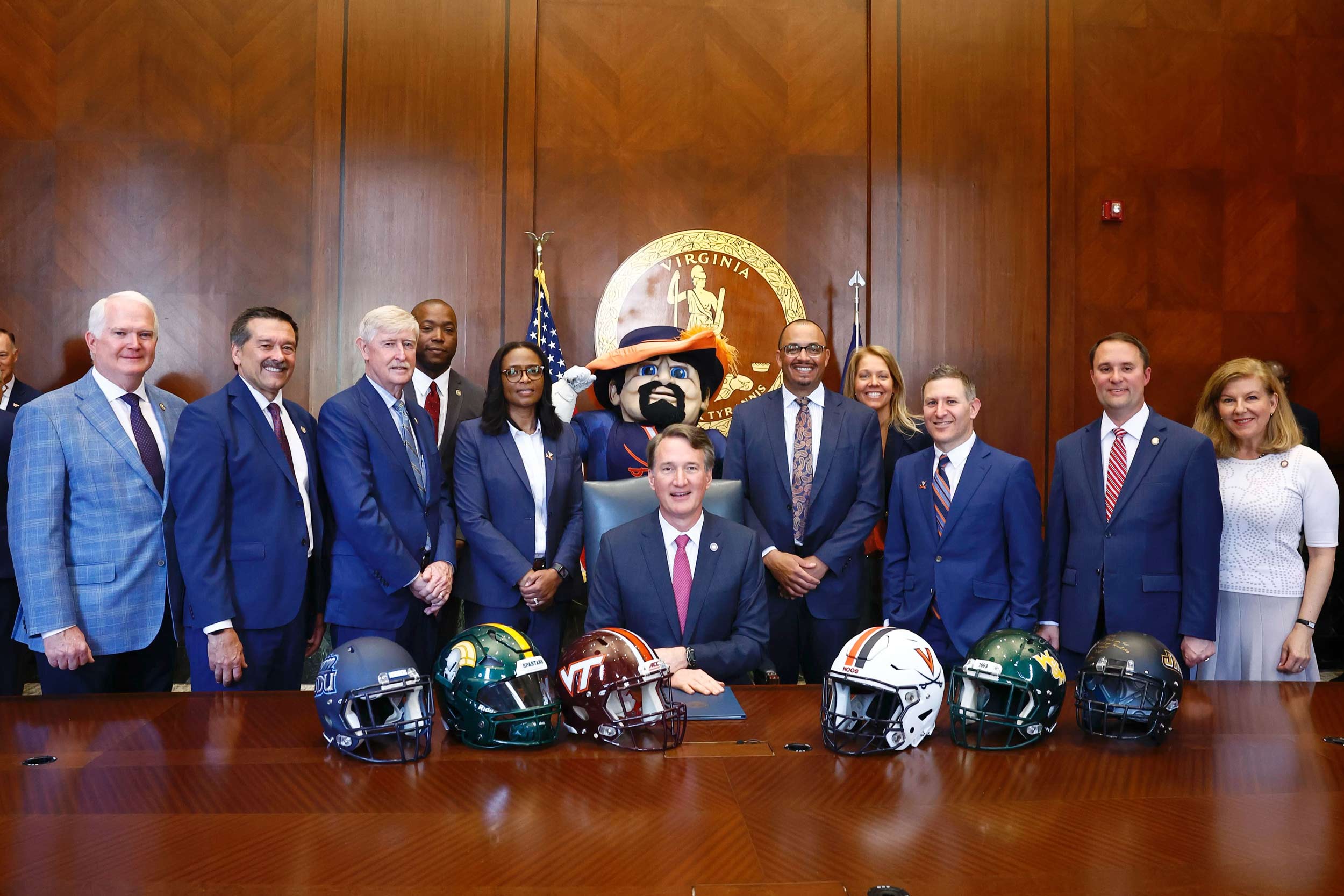 A delegation from UVA with Virginia Gov. Glenn Youngkin 