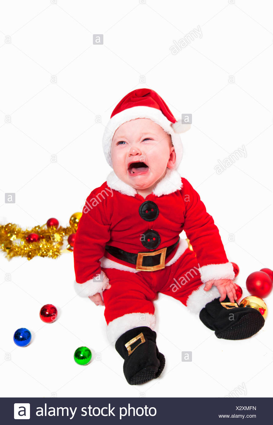 cute-baby-in-father-christmas-outfit-X2XMFN.jpg