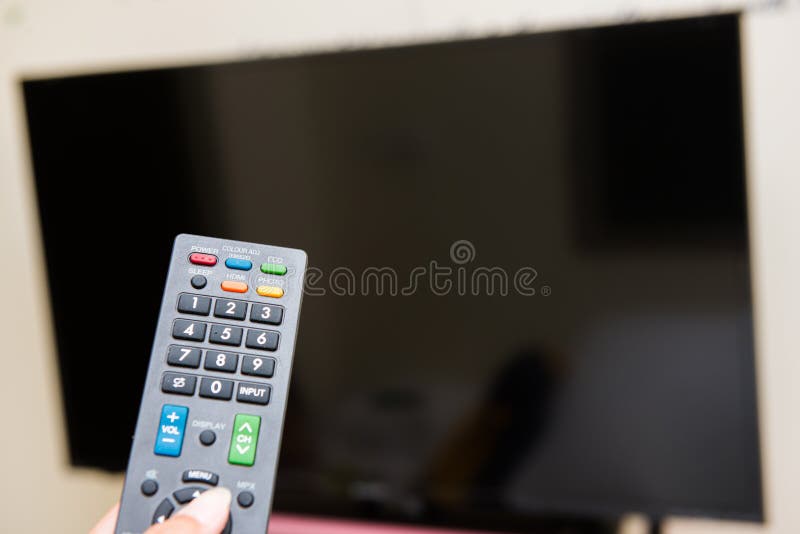 hand-pressing-remote-control-to-turn-tv-television-58319555.jpg