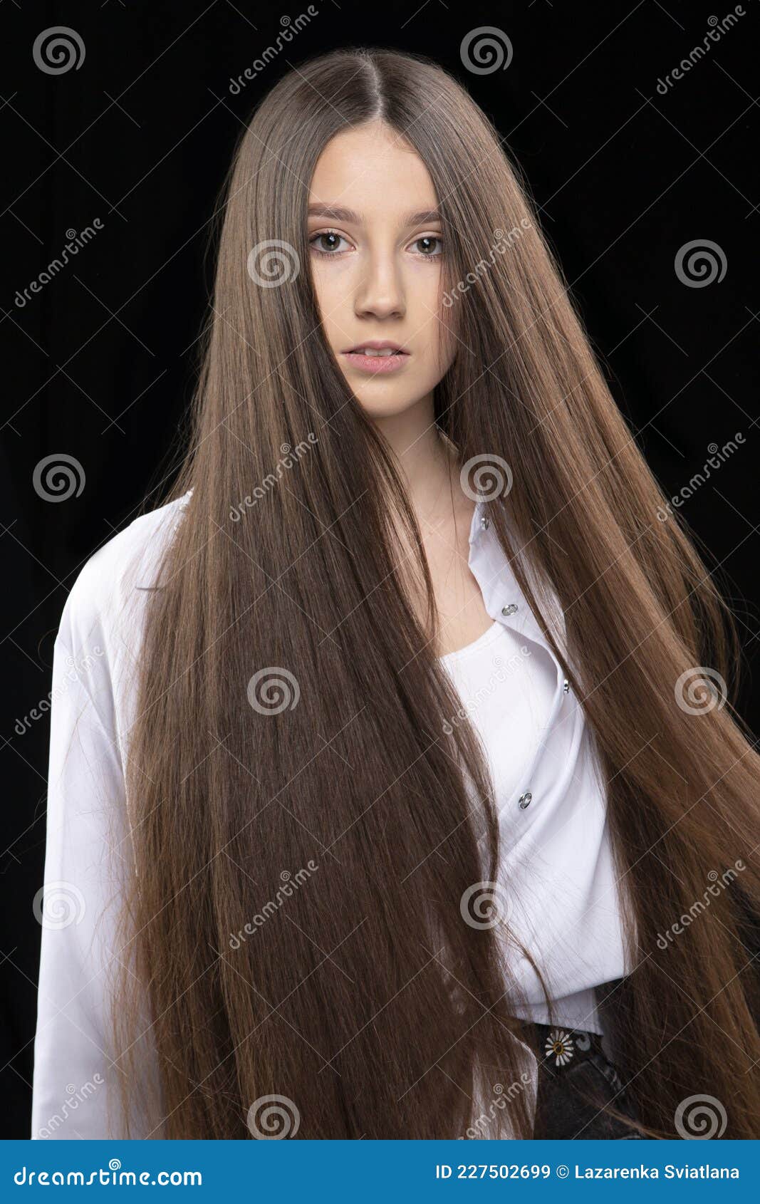 beautiful-girl-dark-long-hair-vertical-portrait-beautiful-girl-very-long-luxurious-hair-dark-background-227502699.jpg